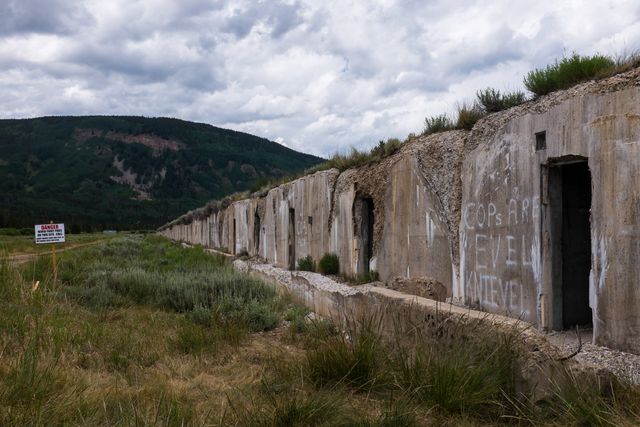 Abandoned bunkers at Camp Hale, where the 10th Mountain Division trained during World War II. Note the warning sign for unexploded ordinances in the area.