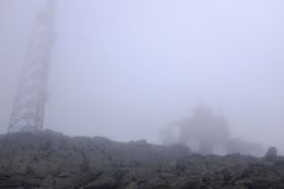 The clouds were thick as we climbed Mount Washington. Structures popped out when we were only steps away. Temperatures around 45 degrees too, with winds around 15 mph. (August 13, 2015)